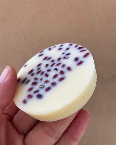 Imbibe Massage Bars in hand
